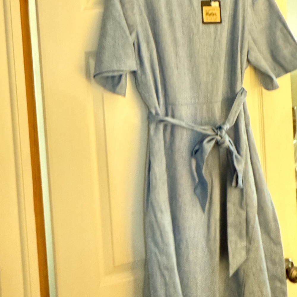 Denim New with tags
St John. Size 16